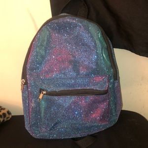 Small women’s sparkly blue backpack : )